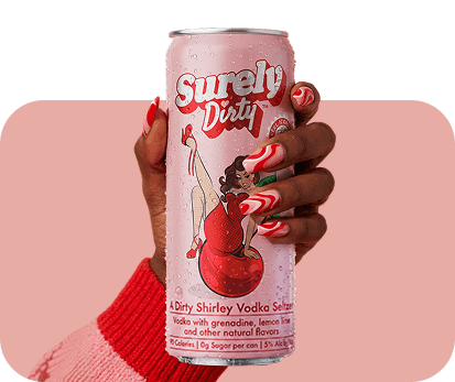 Hand holding a Surely Dirty cherry drink can.